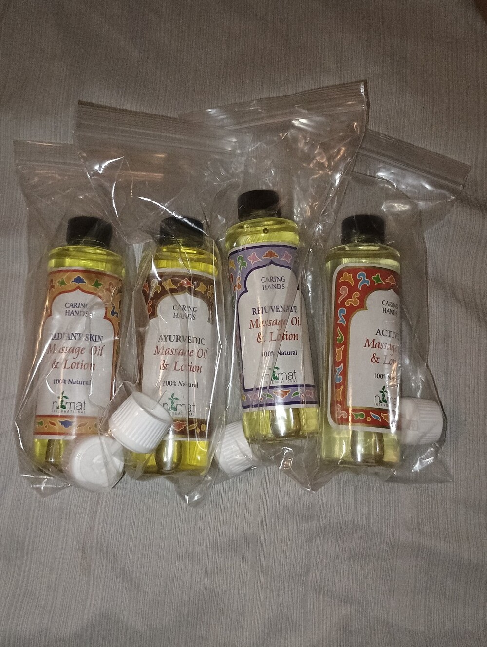 Nemat Massage Oil & Lotion - Assorted Scents 4 Pack